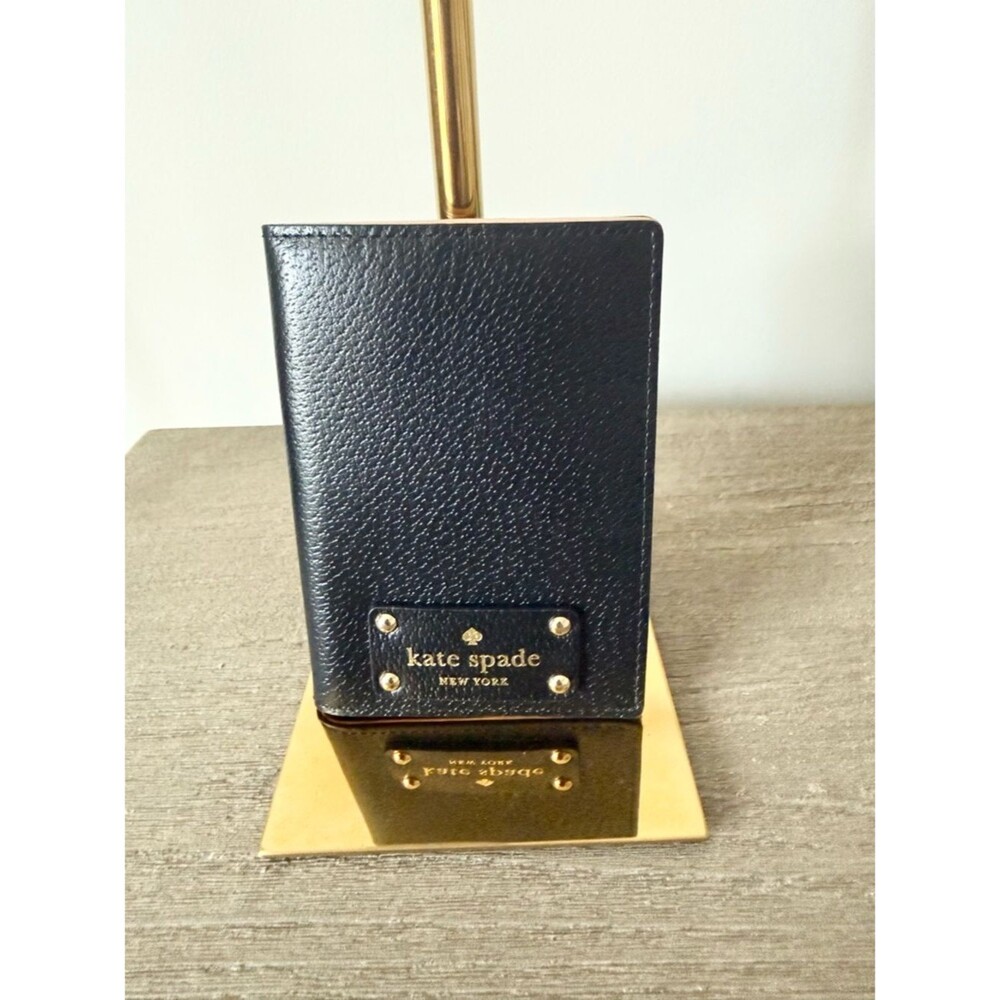 kate spade Black Pebbled Leather Passport Wallet with Gold Accent EUC